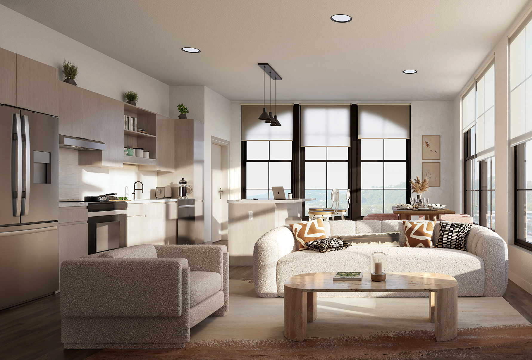 Model living room and kitchen at Albion Lawrenceville apartments in Pittsburgh, PA, featuring wood grain floor paneling.