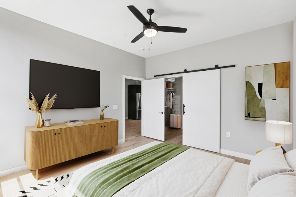 Bedroom with bed and large walk in closet