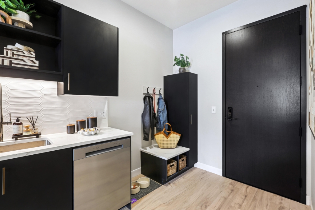 Mud room space with baskets and built-in seating